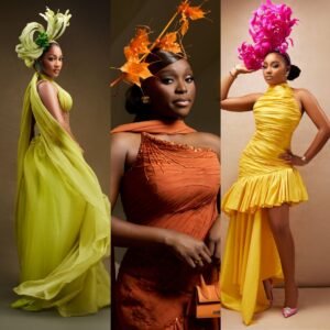 Hawa Magaji in a chartreuse chiffon gown, Tomike Adeoye in a burnt orange dress with Jacquemus bag, and Kiky Festus in a yellow dress with pink feather fascinator at the #ElianasFruitGarden reception.