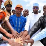Sadio Mané laying the foundation stone for SM10 Agro alongside National Assembly President Ousmane Sonko and local dignitaries in Bambali