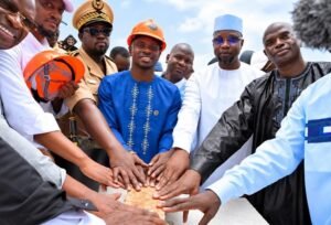 Sadio Mané laying the foundation stone for SM10 Agro alongside National Assembly President Ousmane Sonko and local dignitaries in Bambali